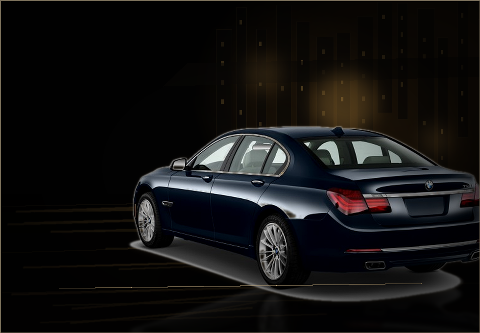 Black BMW 7 Series sedan staged for evening service